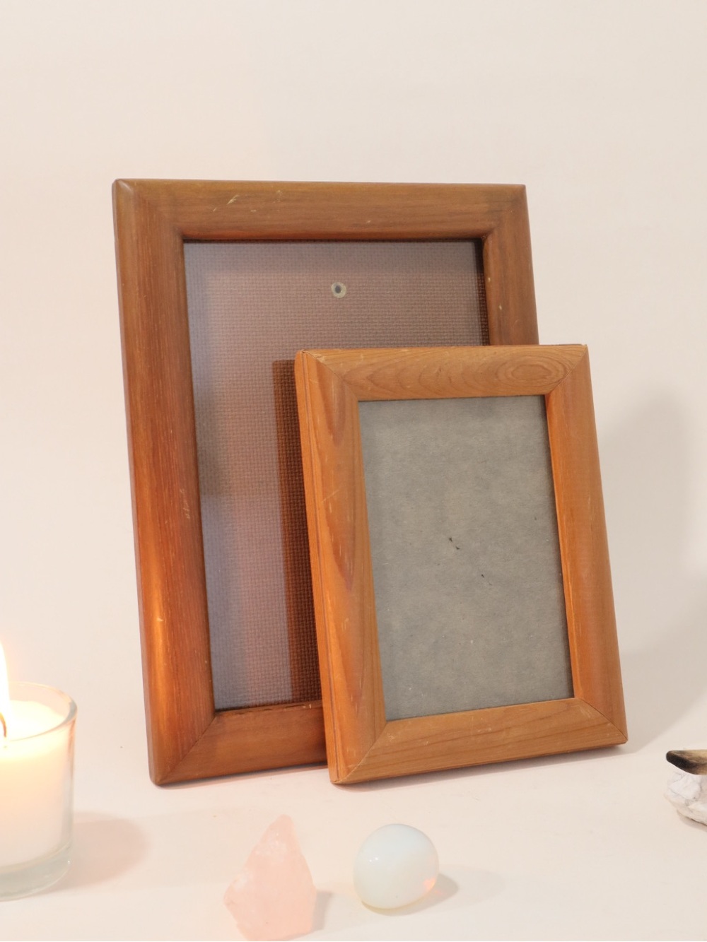 Two vintage wooden picture frames with a classic, mitered profile design MCM